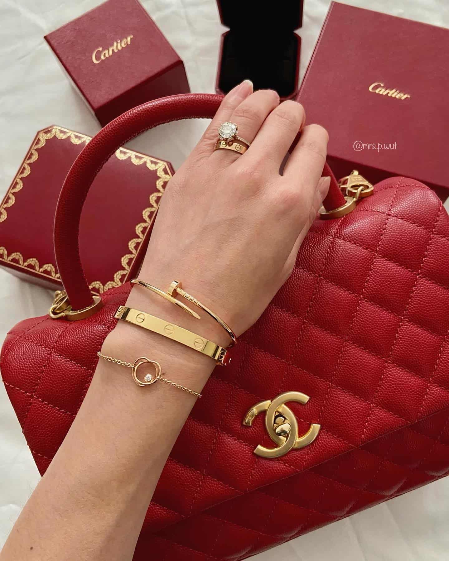 Cartier jewerly and red chanel bag