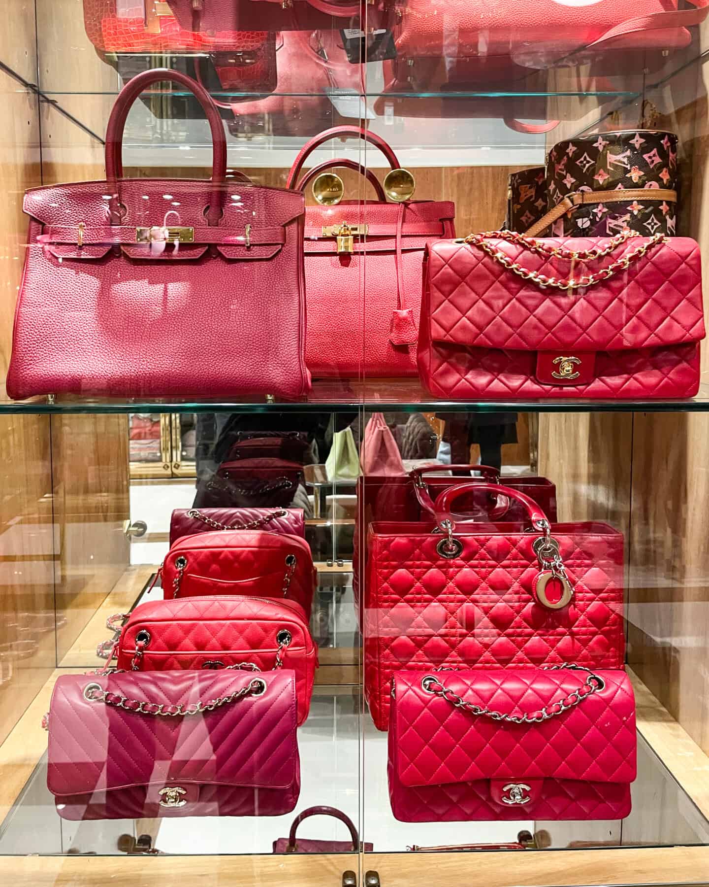Red designer Chanel, Dior and Hermes Bags
